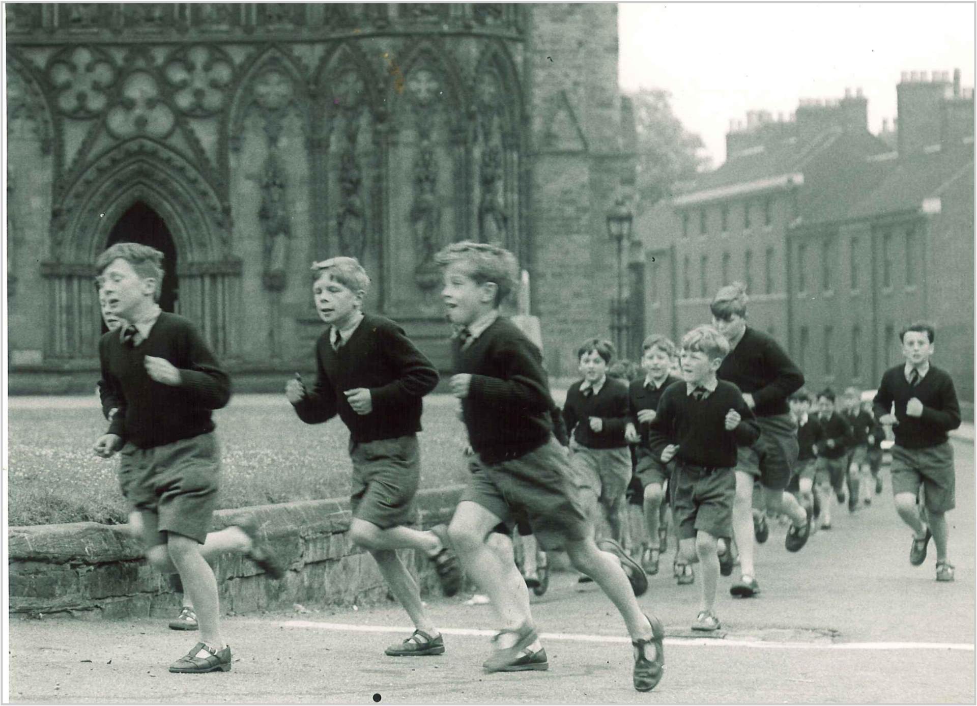 1950s boys running around Cathedral